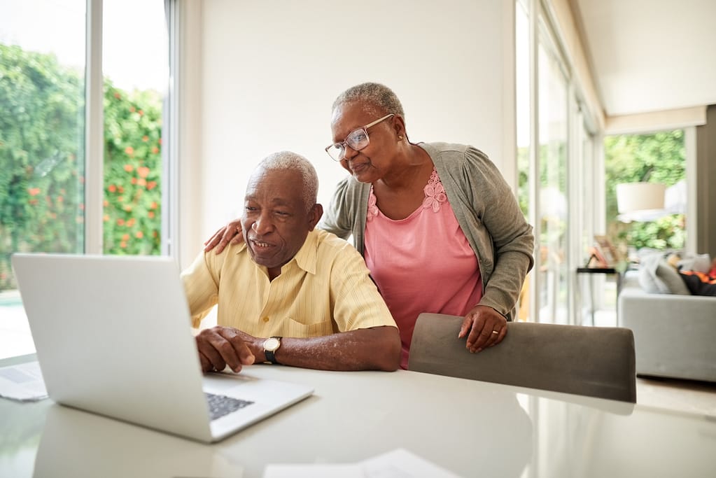 senior couple at laptop gettyimages .jpg