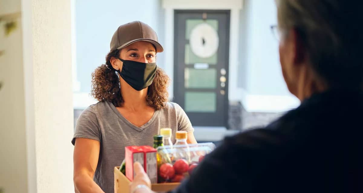 Delivery person drops groceries off GmYwPfu.width .jpg