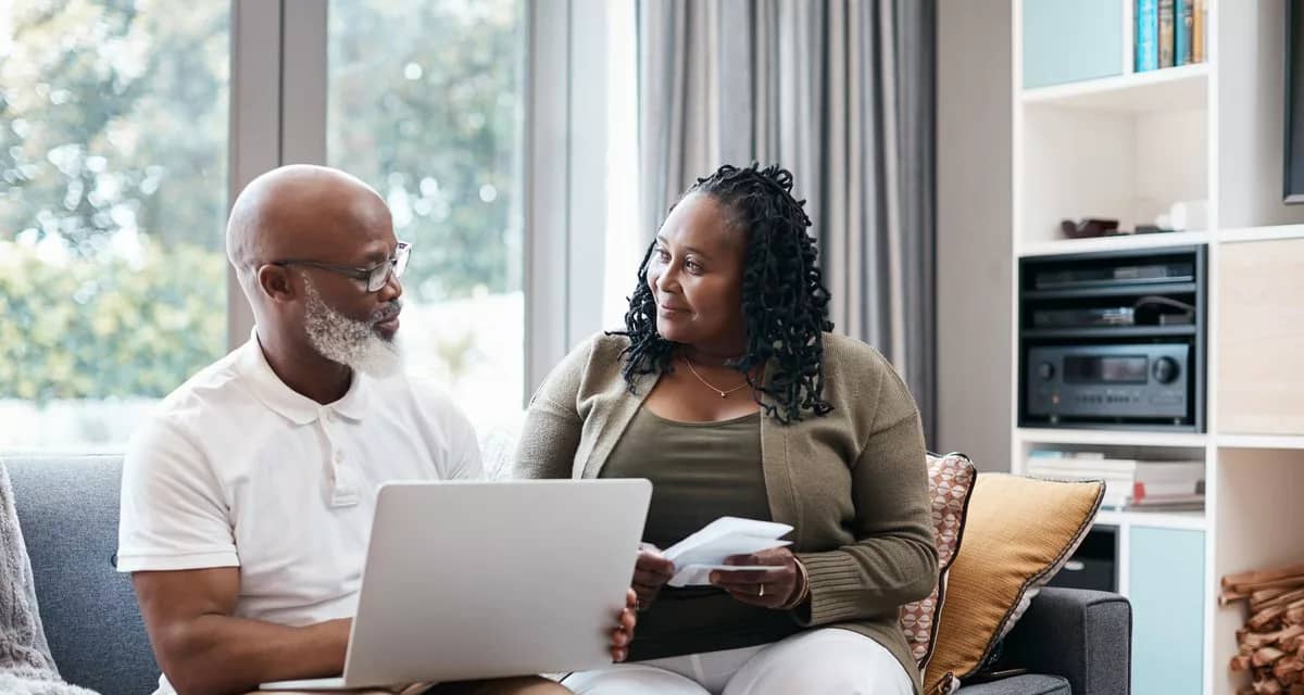 Senior couple sitting on couch together going.width Qvmomn.jpg