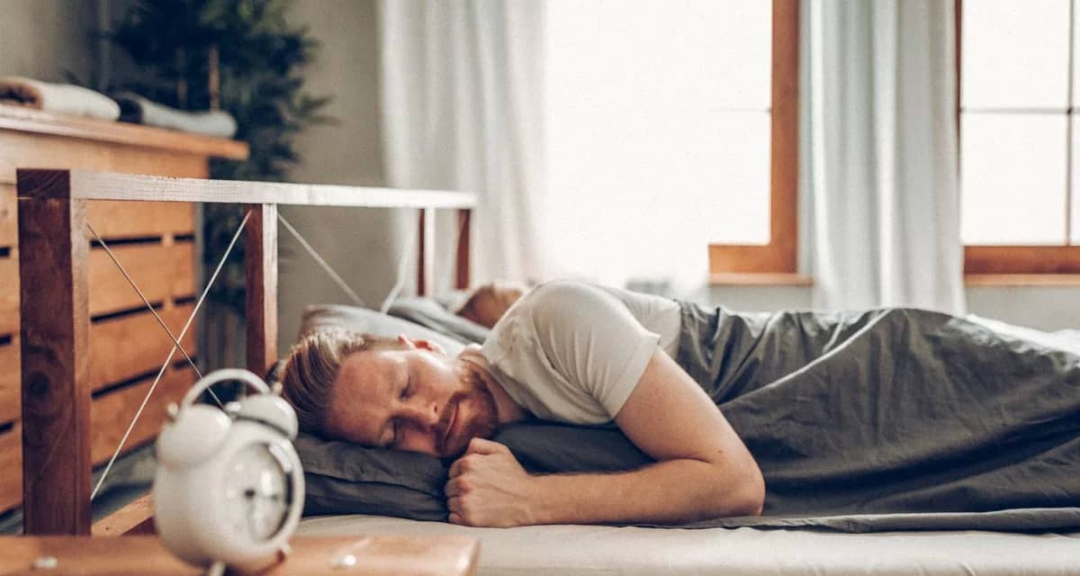 man sleeping in bed oRytPC.width .jpg