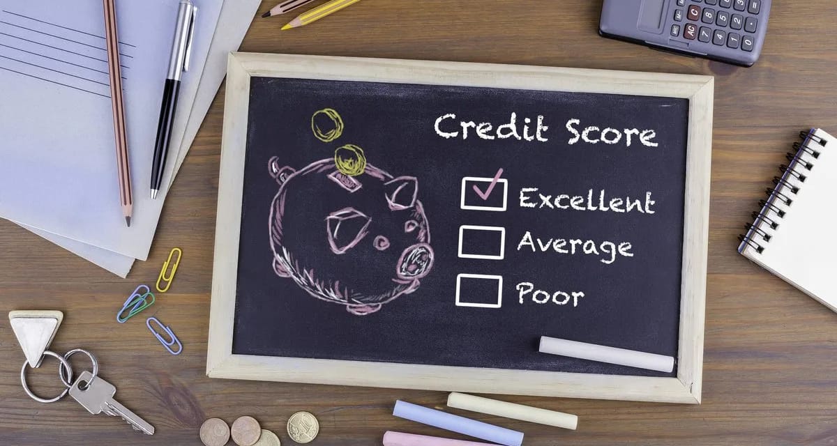 Chalkboard with credit score piggy bank Uagxz.width .jpg