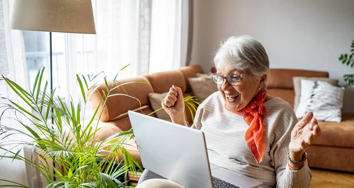 excited person looking at laptop.jpg