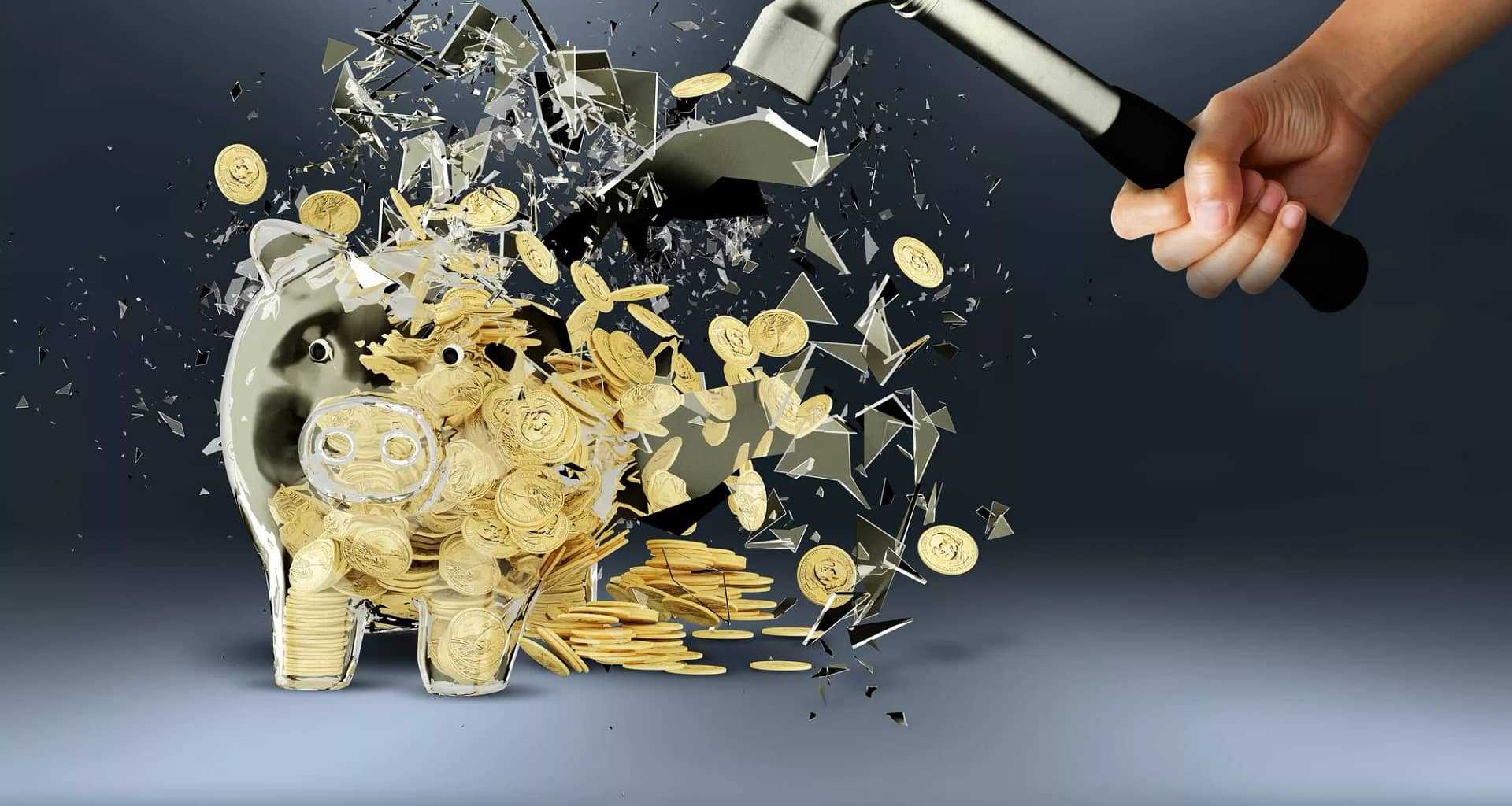 getty images person smashing piggy bank with hammer.jpeg