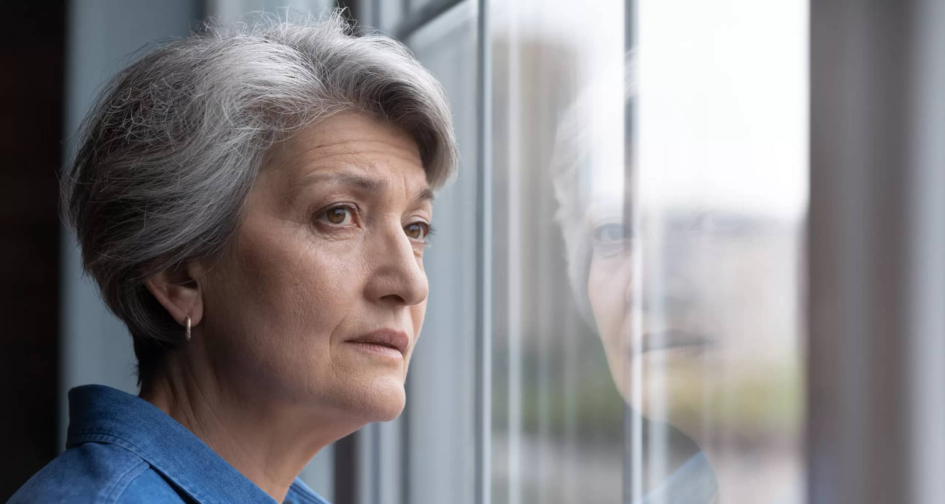 older person looking out of window.jpg