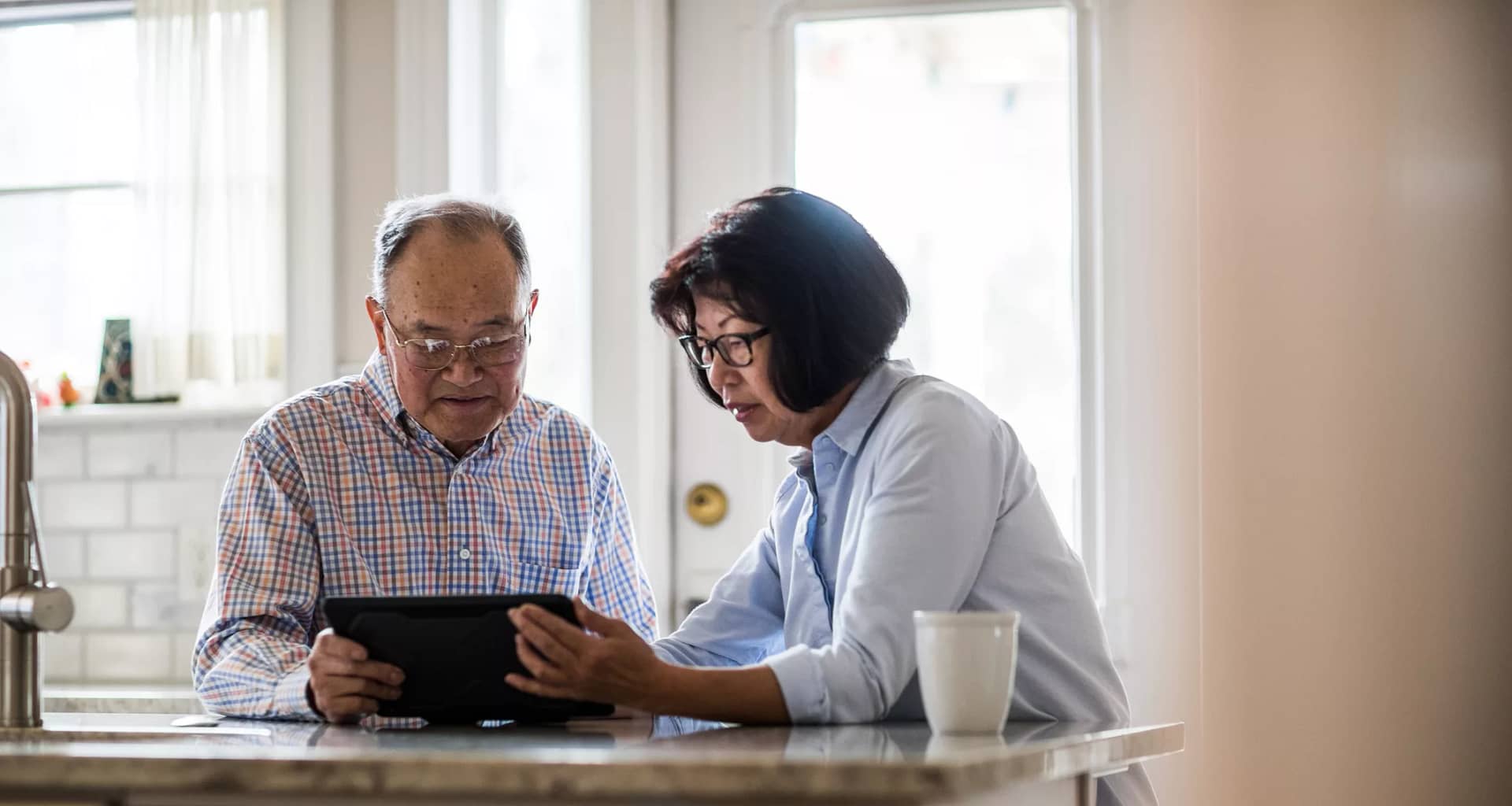 two people using a tablet.jpg