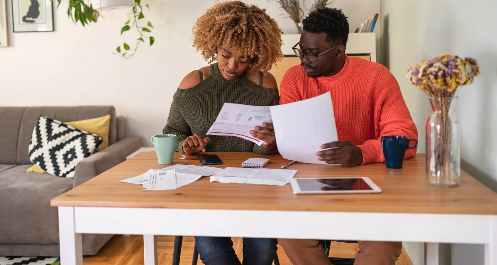 couple reviewing papers budgeting.jpg