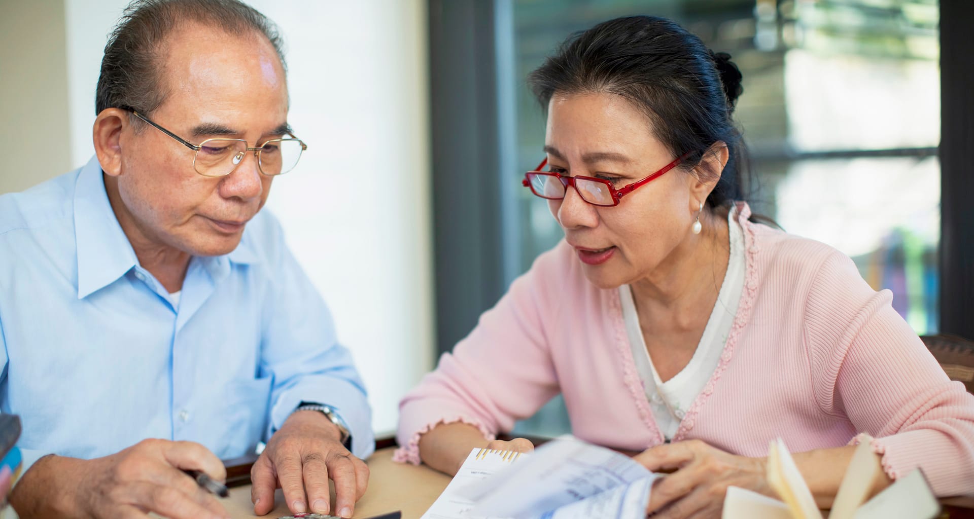 concerned senior asian couple.jpg