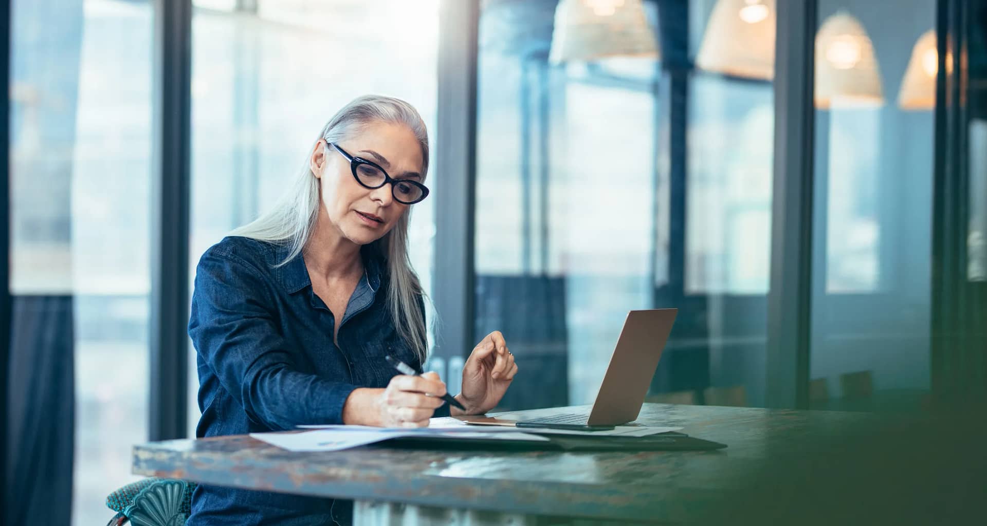 gettyimages older woman working retirement.jpeg