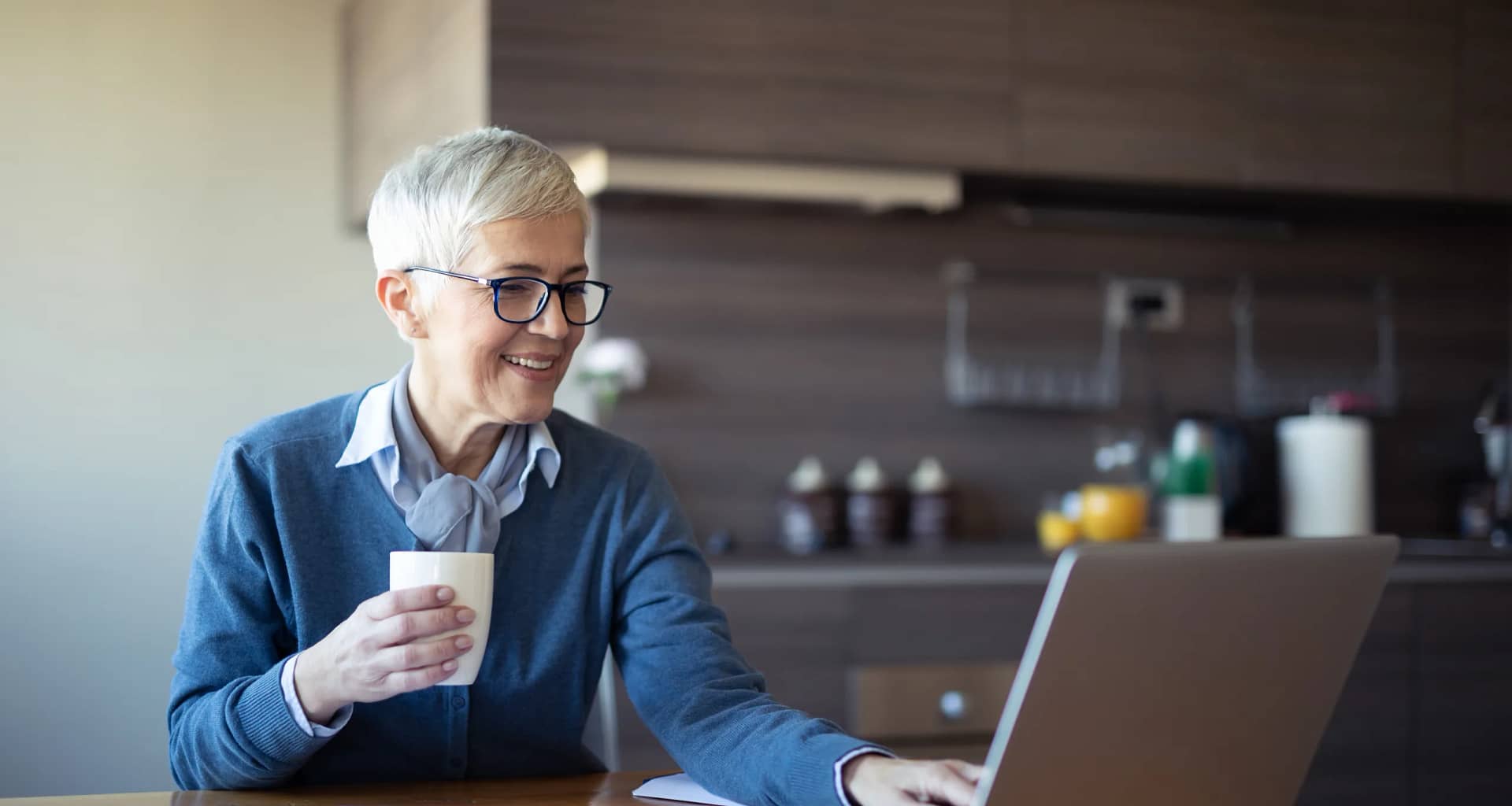 retired woman investing laptop k ira.jpg