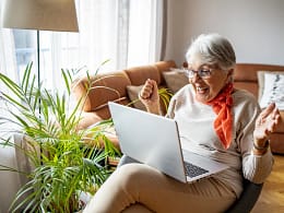 excited person looking at laptop.jpg