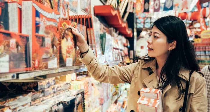 woman buying holiday sweets.width .jpg