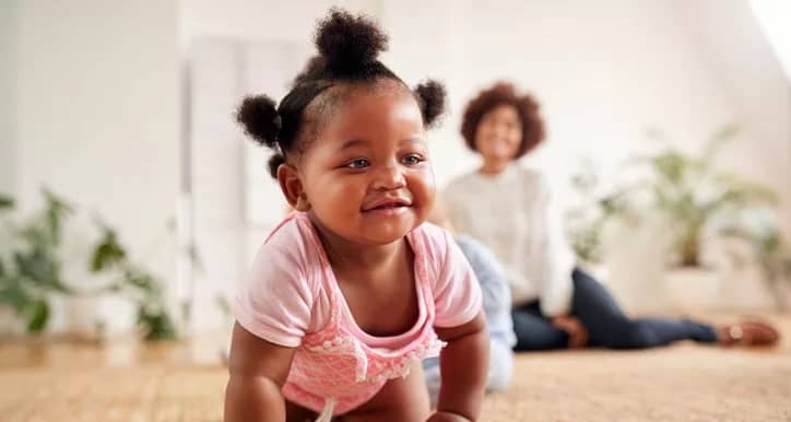 baby crawling with mom.width .jpg