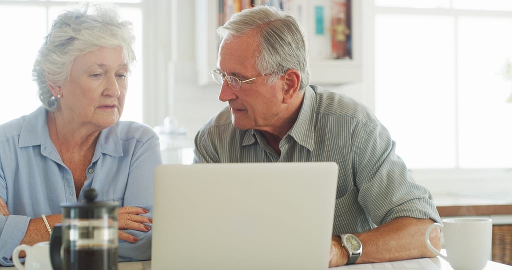 senior couple laptop serious gettyimages