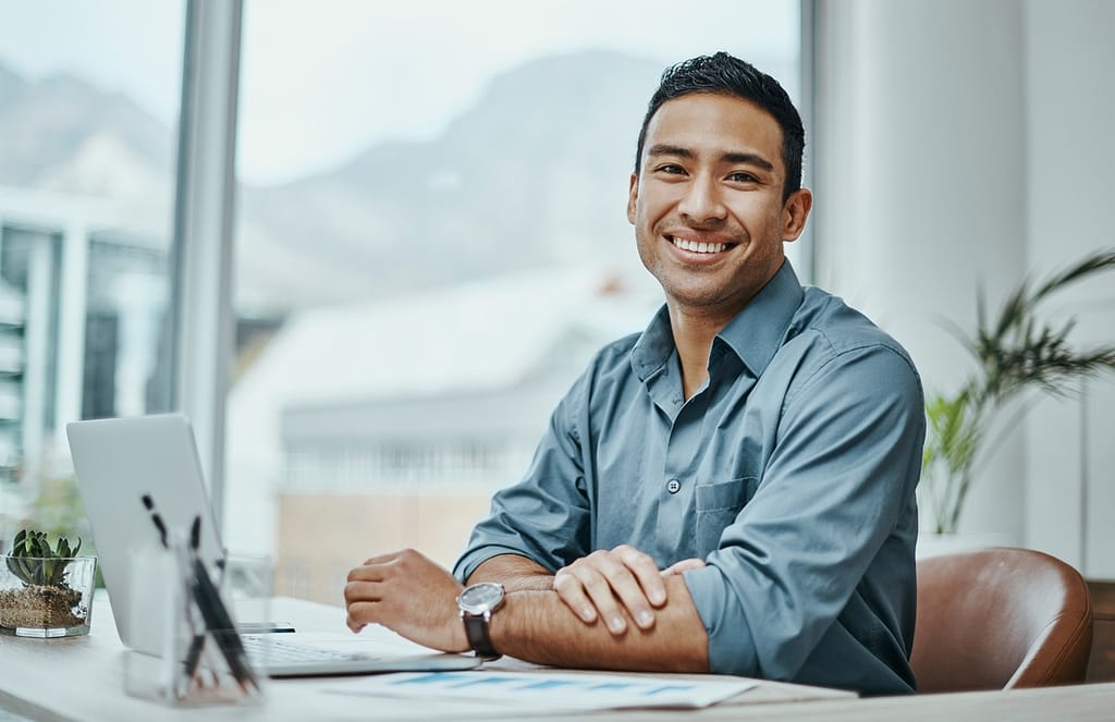 man s or s smiling laptop gettyimages