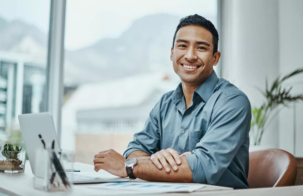 man s or s smiling laptop gettyimages .jpg