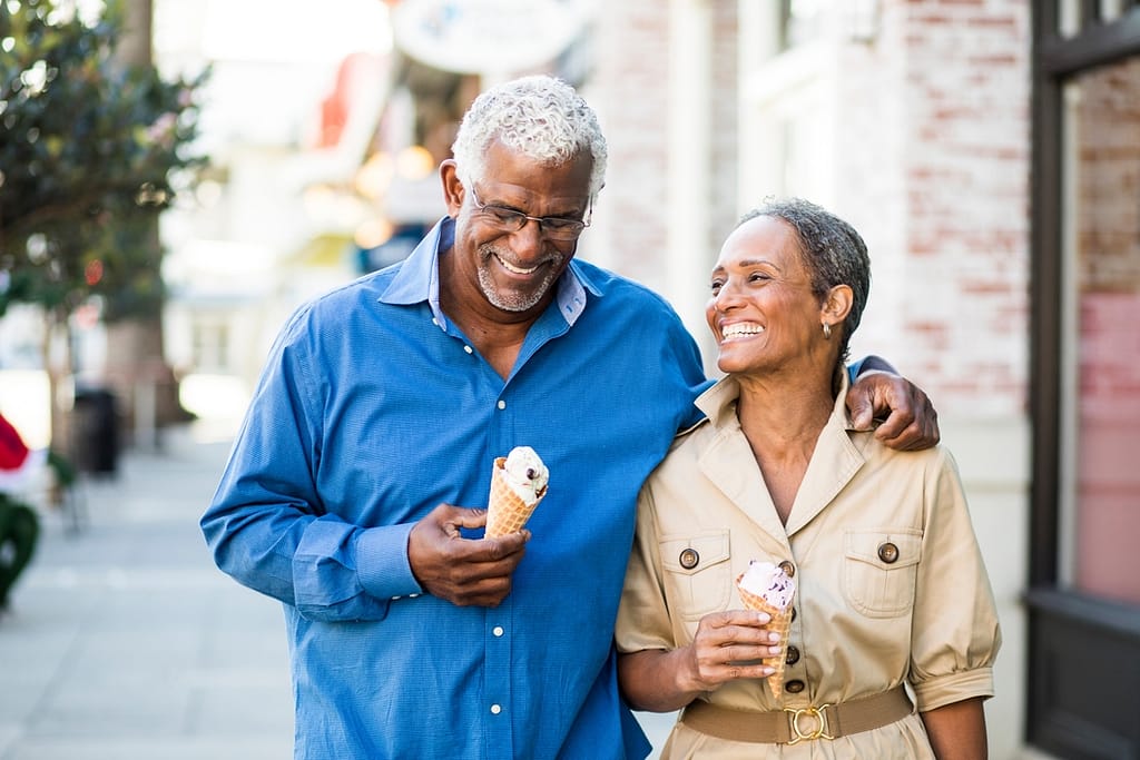 getty happy couple outdoors with ice creams