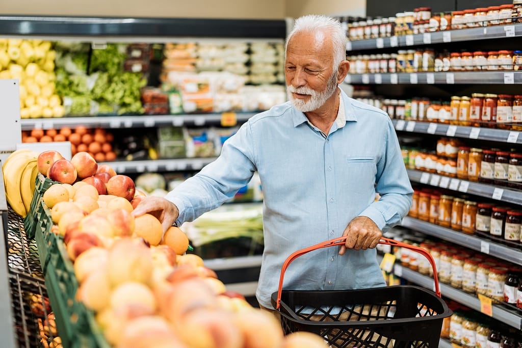 senior man grocery store gettyimages
