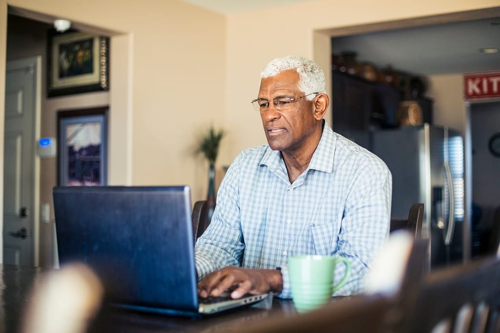 senior man laptop gettyimages