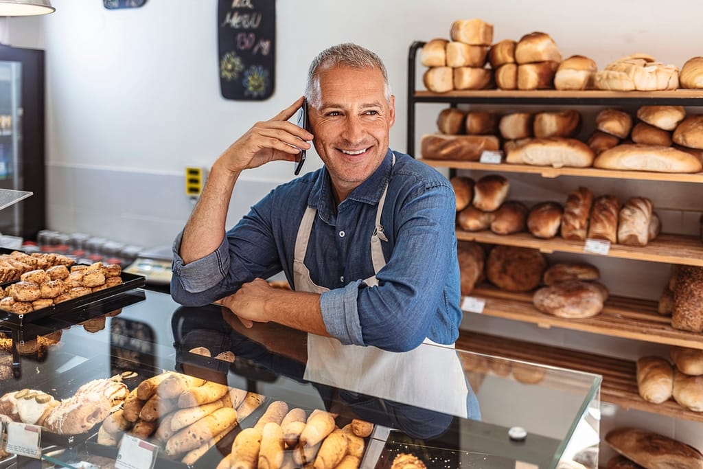 senior man working in bakery gettyimages
