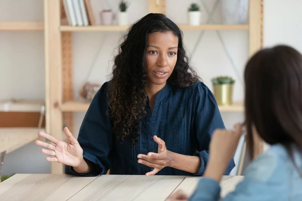 Professional woman having a sit down discussi.width agnUSL.jpg