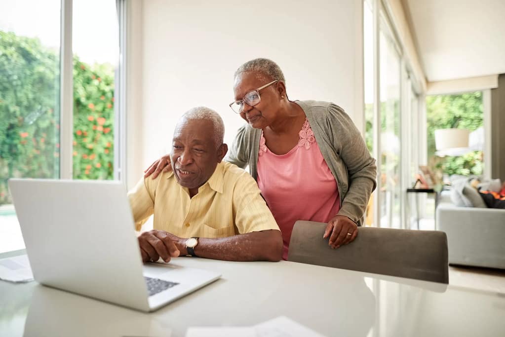 senior couple at laptop gettyimages .jpg