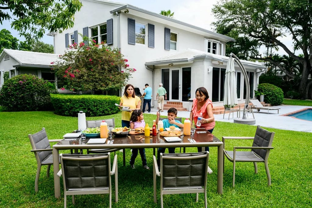 family eating in backyard oZHcaG.width .jpg