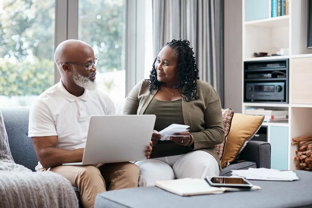 Senior couple sitting on couch together going.width Qvmomn.jpg