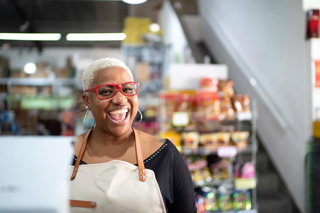senior a smiling person in an apron gettyimages .jpg