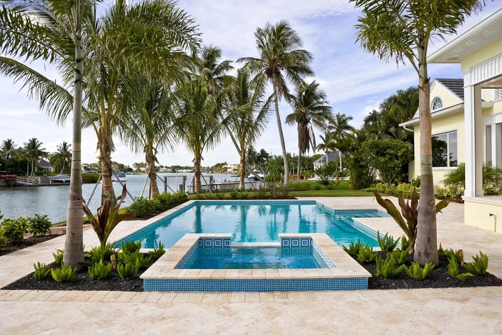 Backyard pool and palm trees on lagoon qTsDr.width .jpg