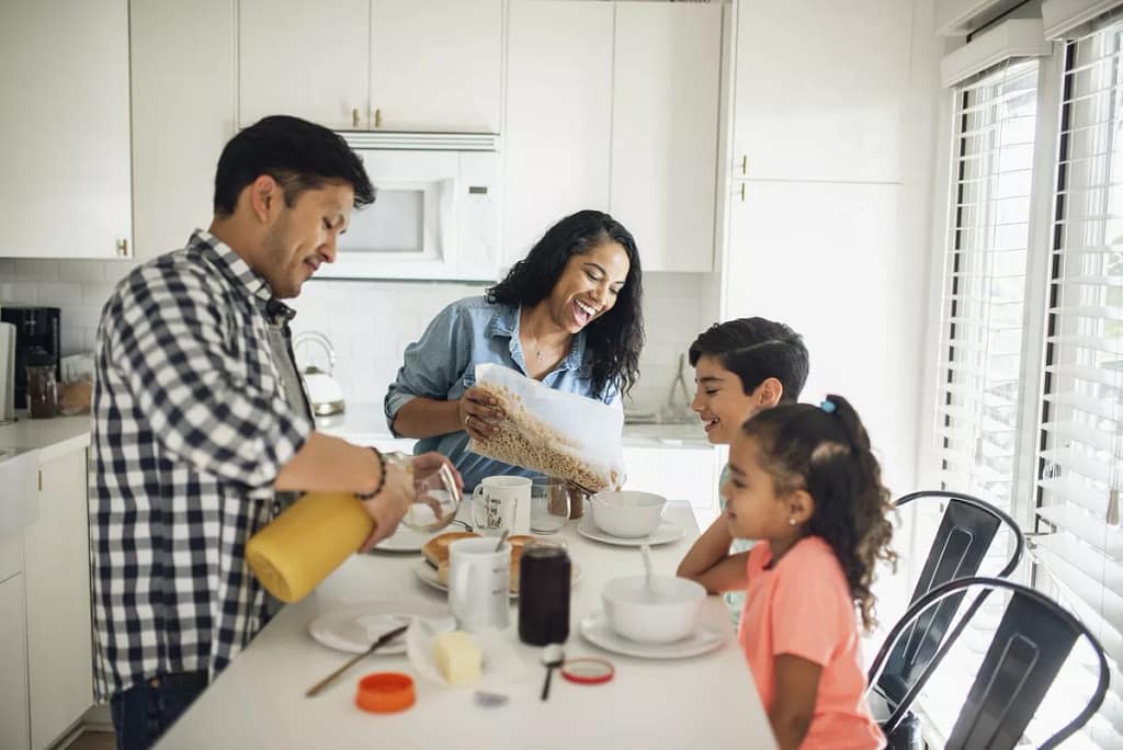 young family eating breakfast.width .jpg