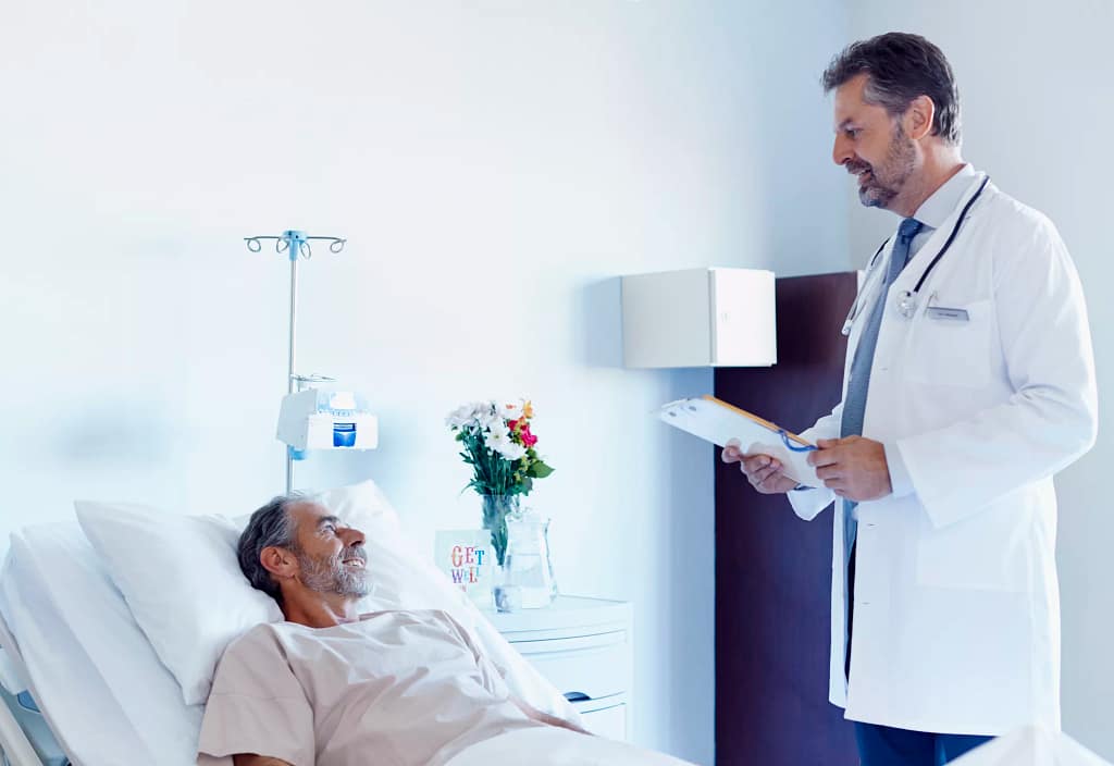 doctor with older male patient gettyimages .jpg