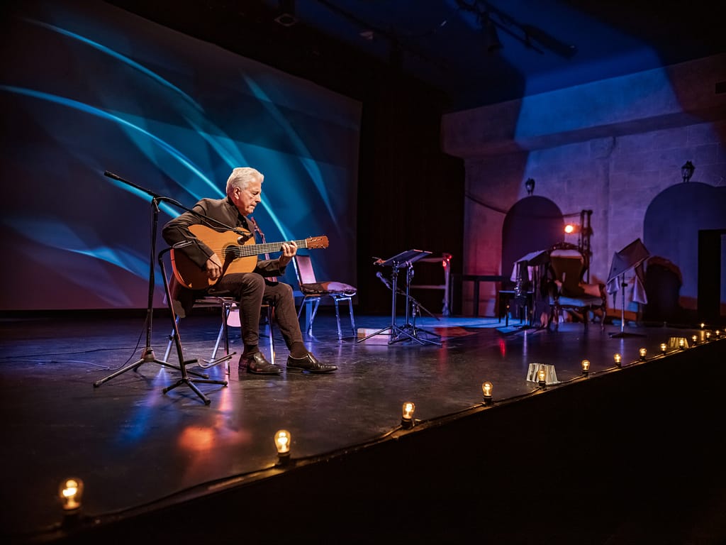 older man guitar stage gettyimages .jpg