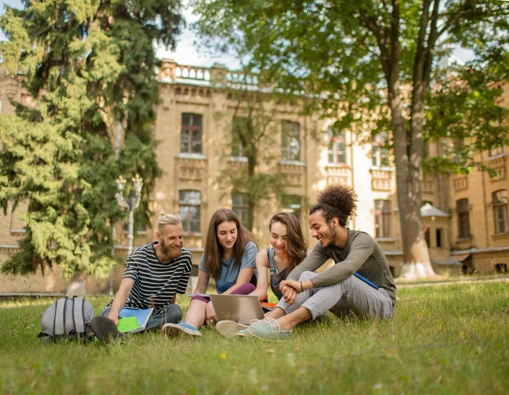 College students studying on grass KaLEug.width .jpg