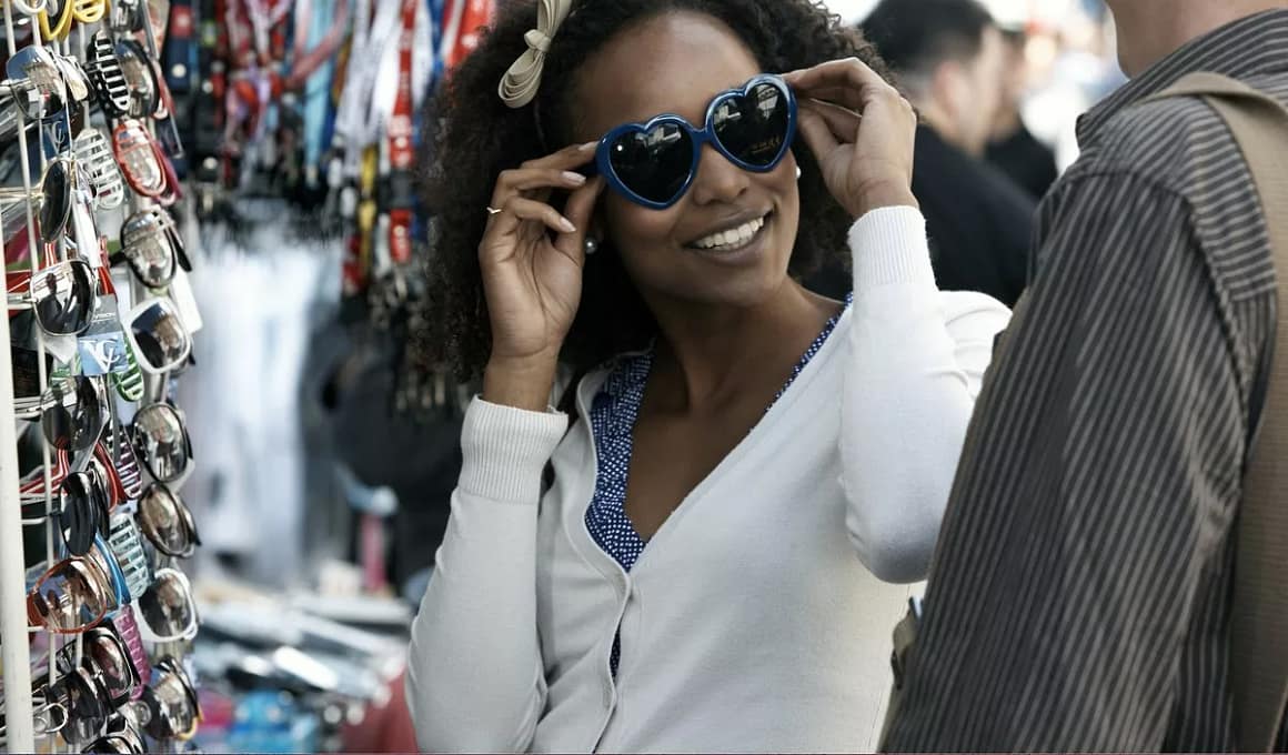Woman shopping for sunglasses RSnHkOr.width .jpg