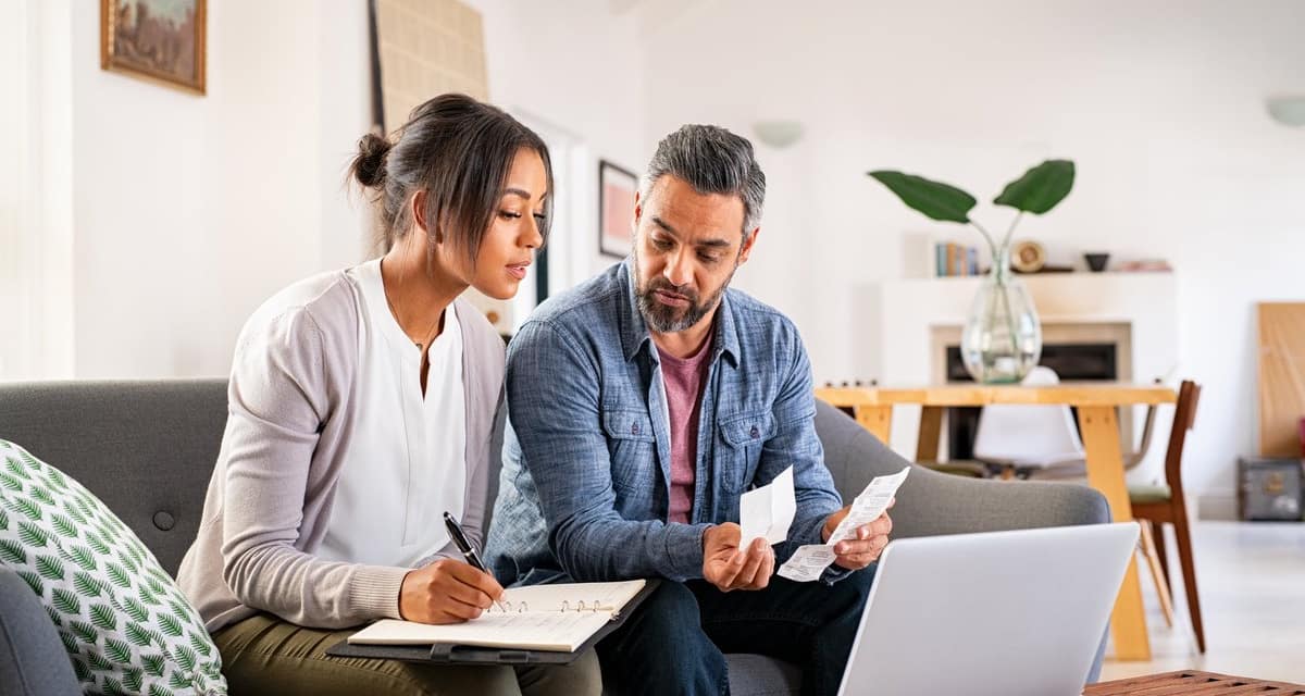Couple working on taxes. ncVJUD.width