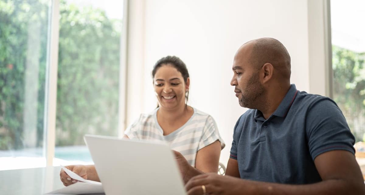 mature couple doing taxes FlzKDuS.width