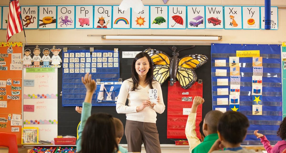 elementary school teacher in classroom CIzzZ.width .jpg