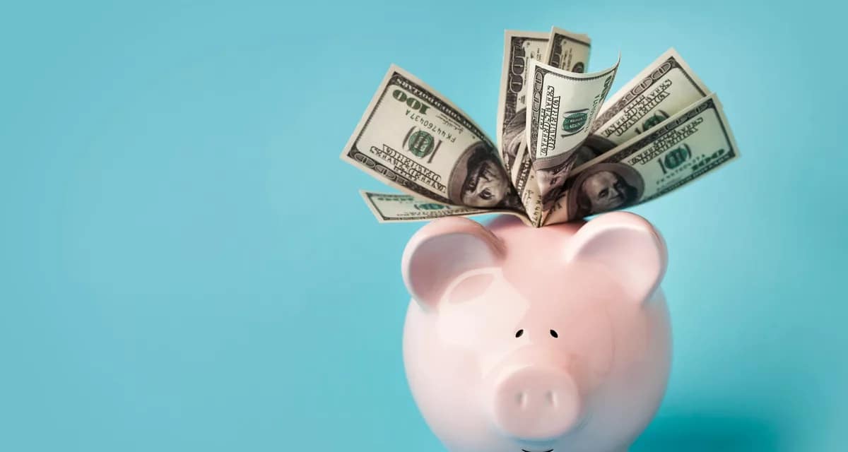 gettyimages overstuffed piggy bank.jpeg