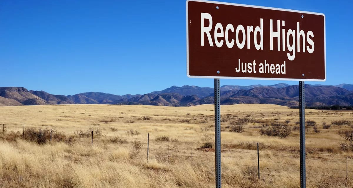 road sign reads record highs just ahead.jpg