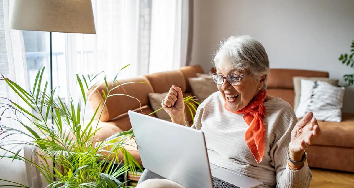excited person looking at laptop.jpg
