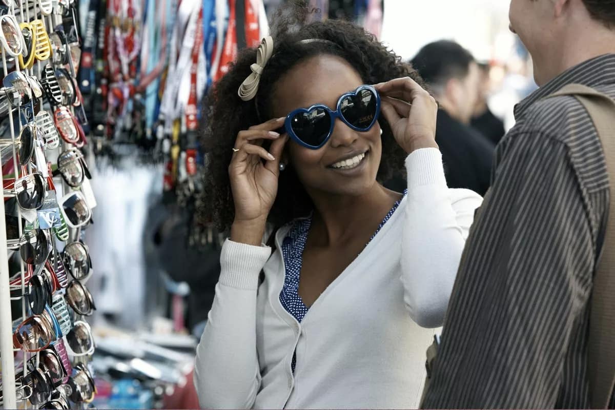 Woman shopping for sunglasses RSnHkOr.width .jpg