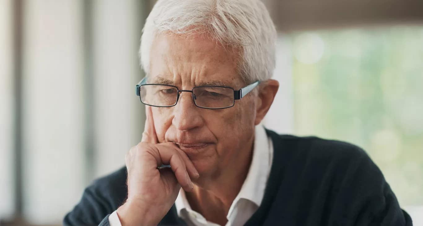 serious man staring intently at laptop.jpg
