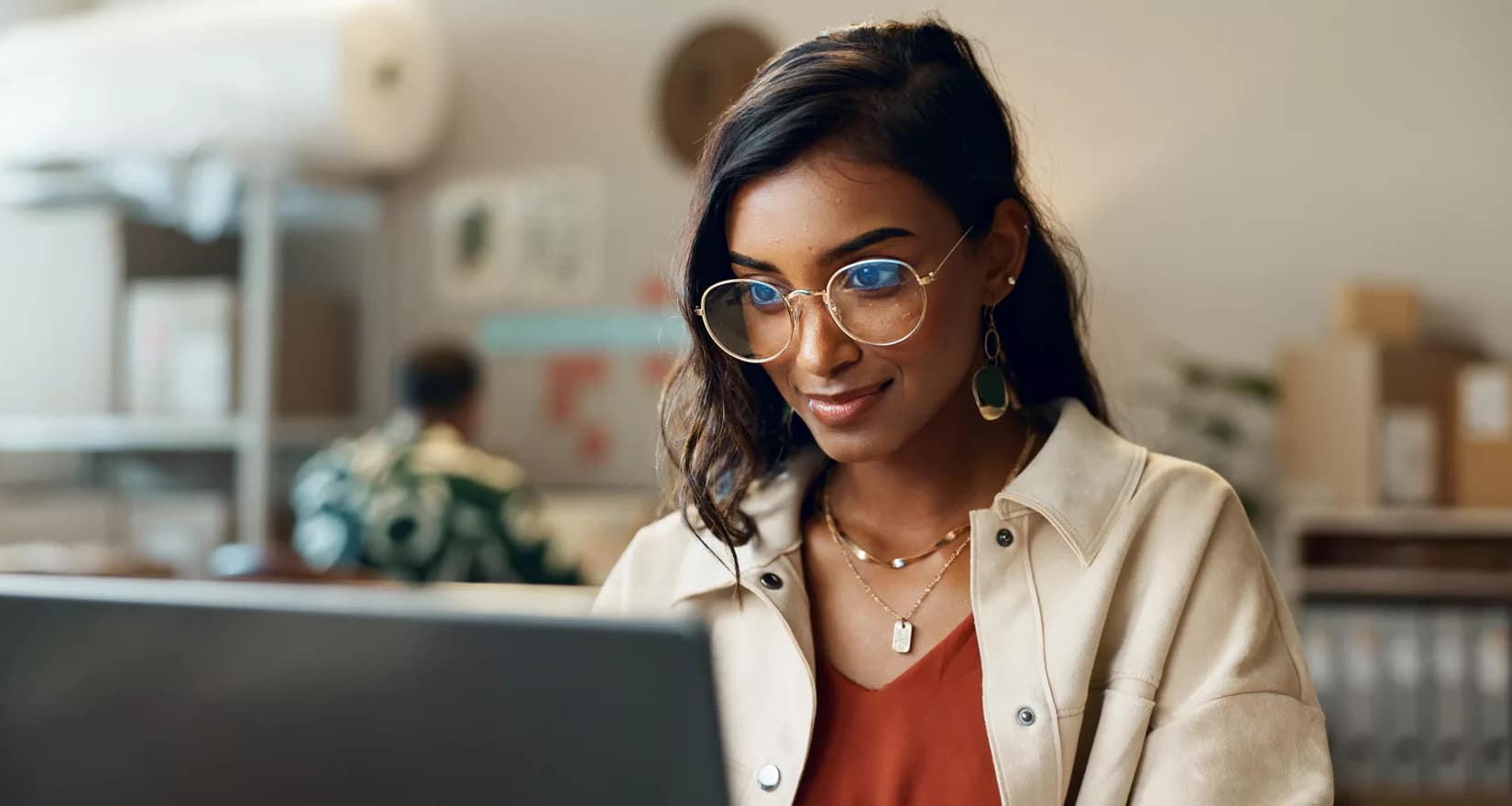 young person looking at laptop.jpg