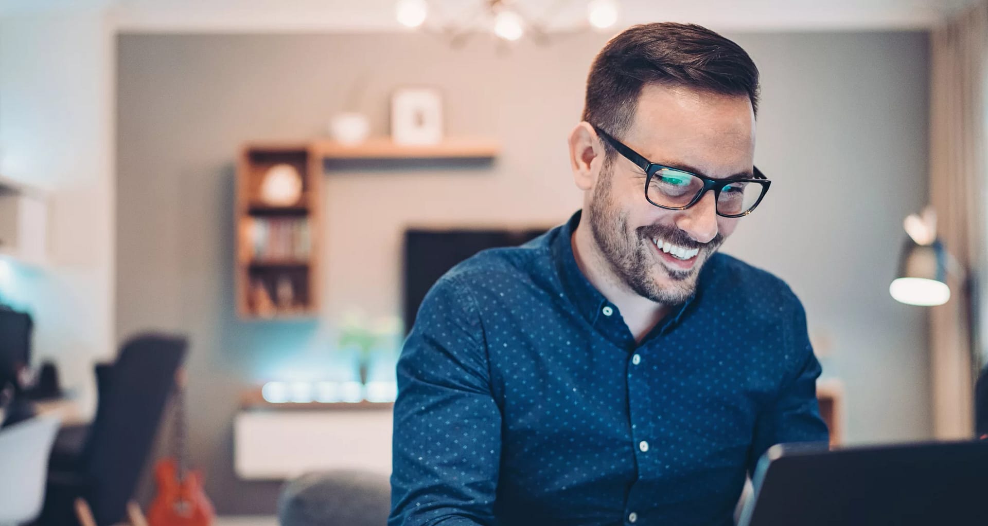 man s smiling laptop gettyimages .jpg