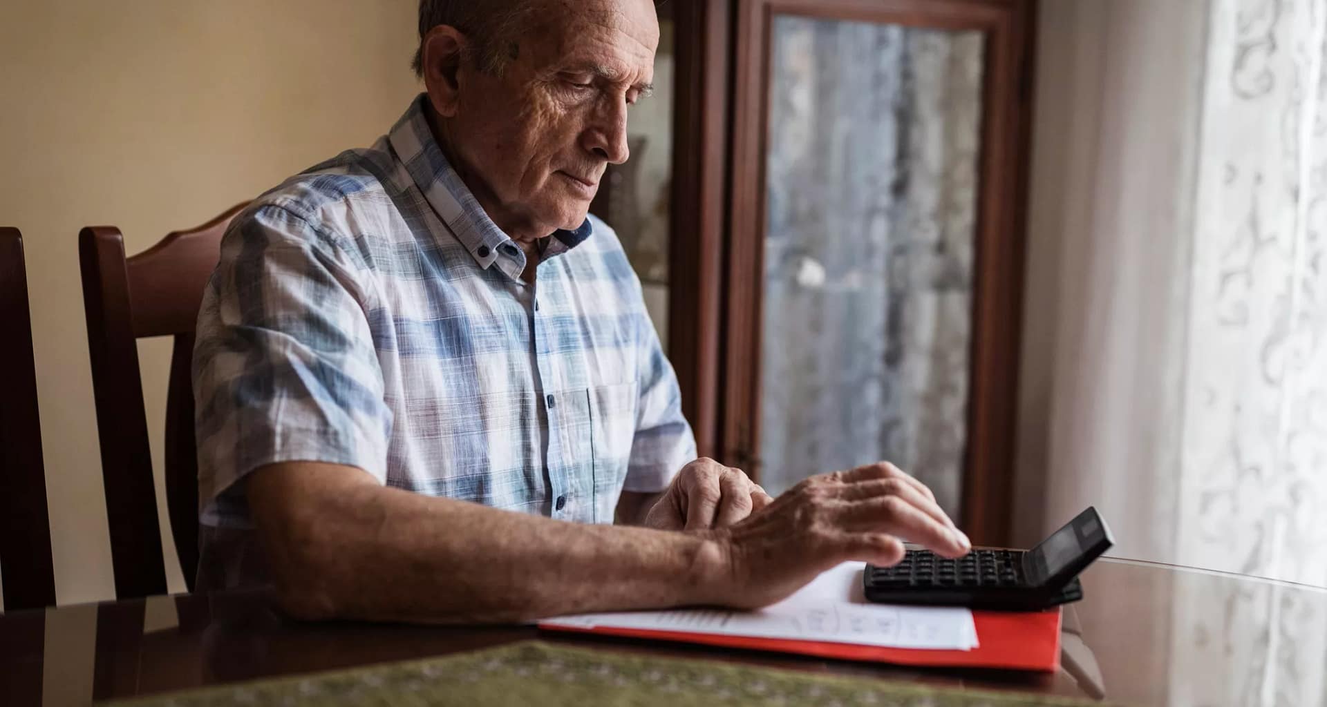 older man calculator gettyimages .jpg