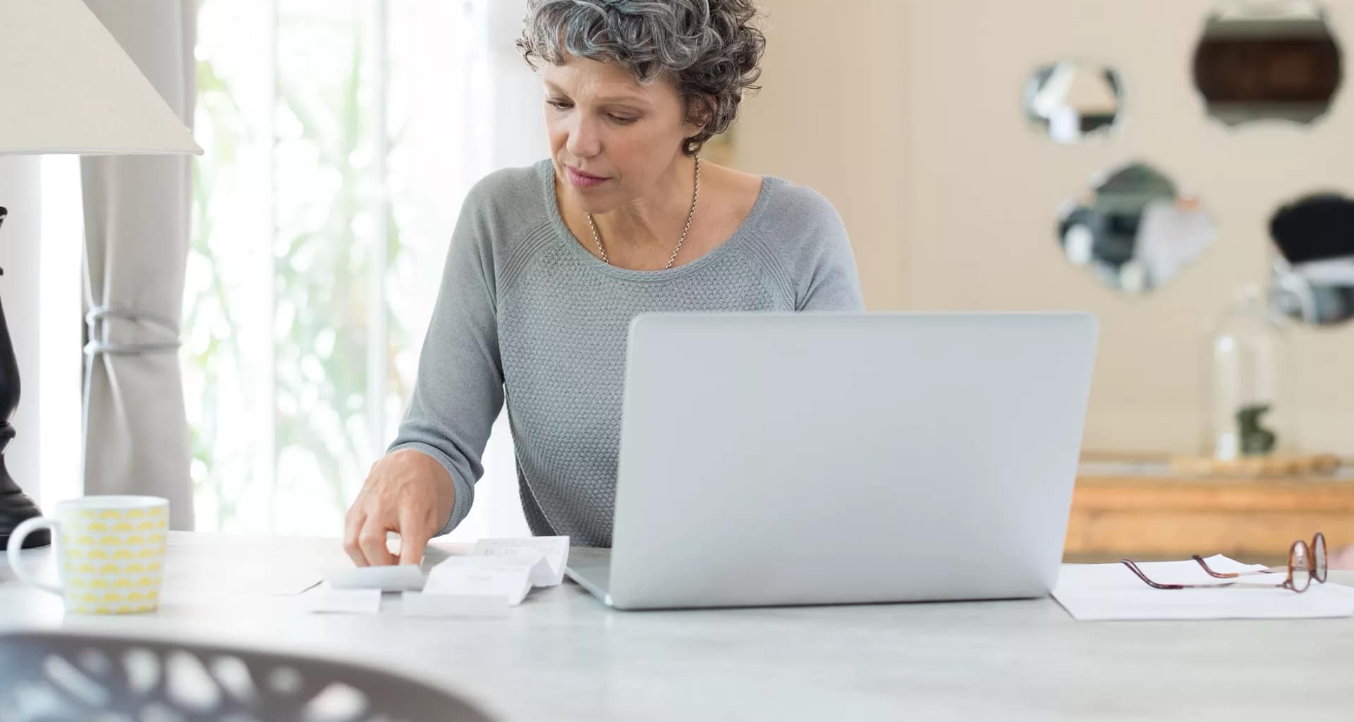 person sitting at table in front of computer.jpg