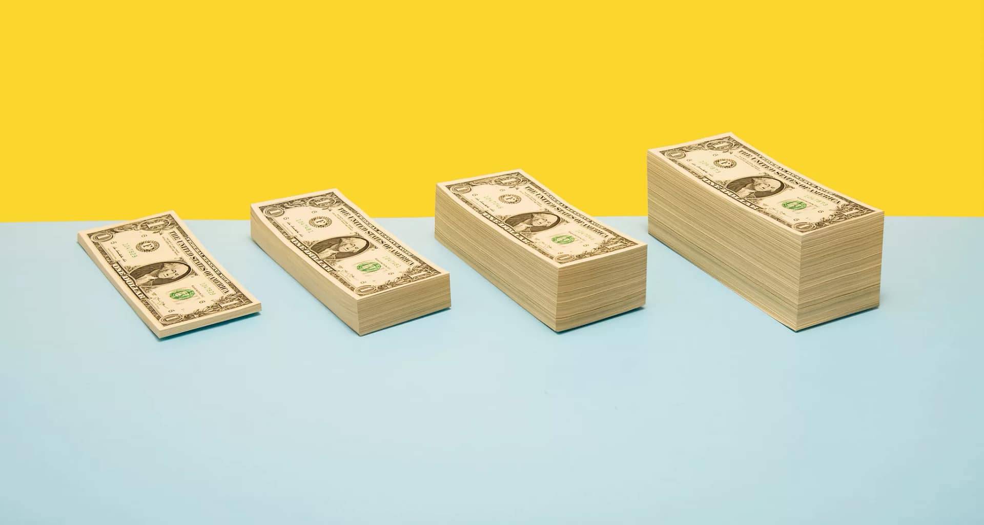 stacks of dollar bills.jpg