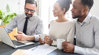 couple consults with advisor
