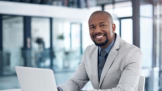man s business suit laptop gettyimages