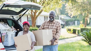 senior couple moving boxes gettyimages